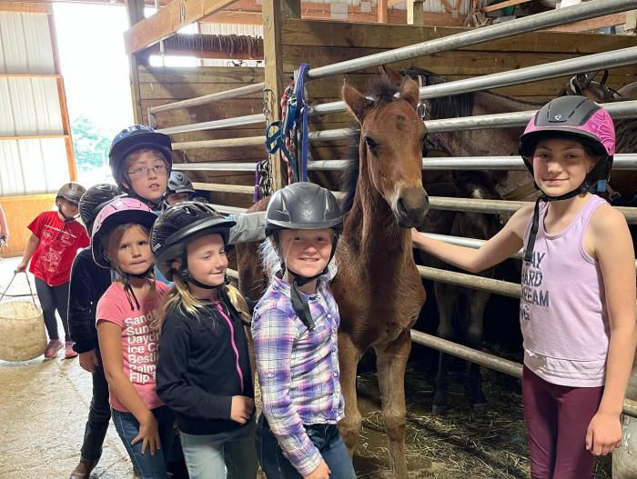 kids riding horses at Wolcott Farms in Warsaw NY