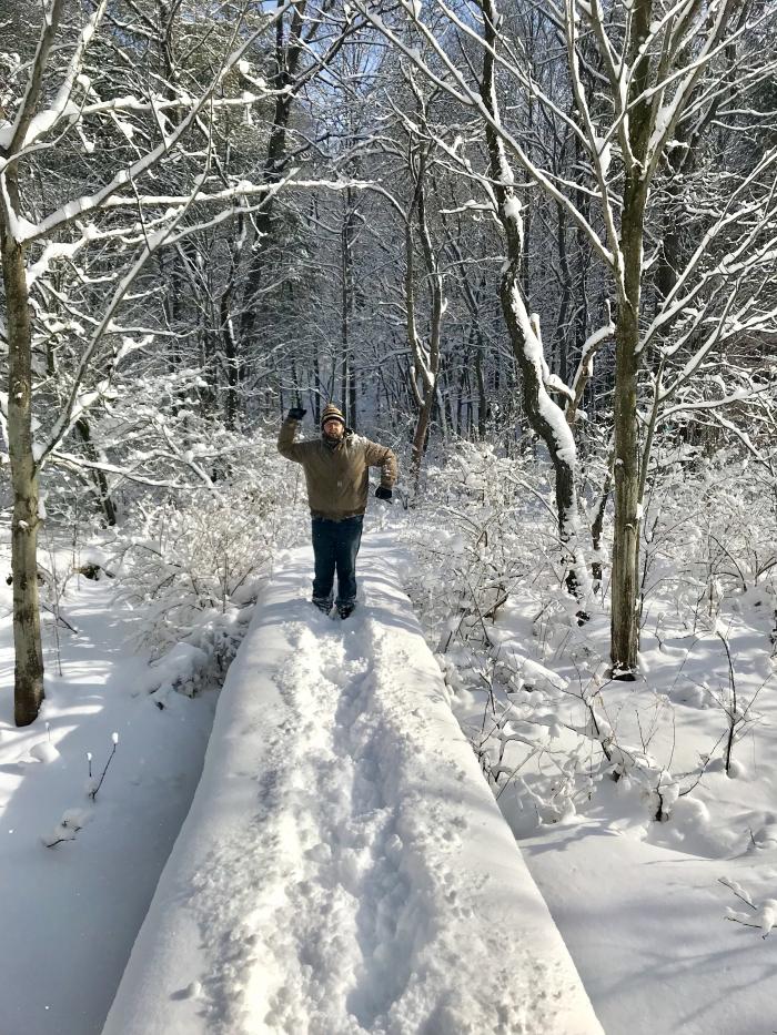 person hiking in snow