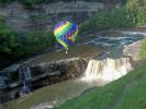Hot air balloon soaring over the Lower Falls - Photo by Beverly Theodore